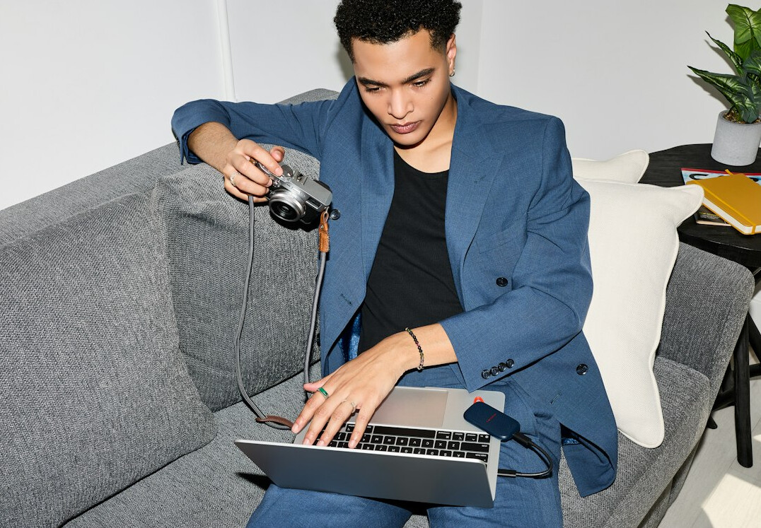 private investigator using laptop
