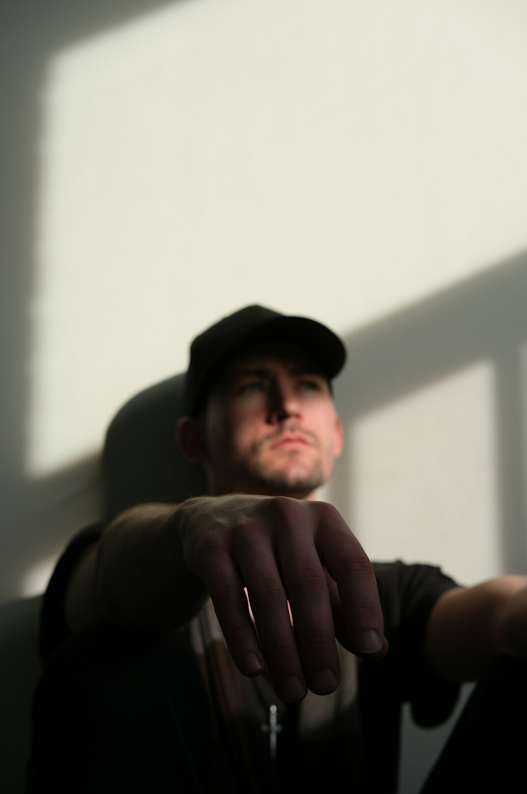 Studio portrait of a Portuguese man in his thirties with short beard