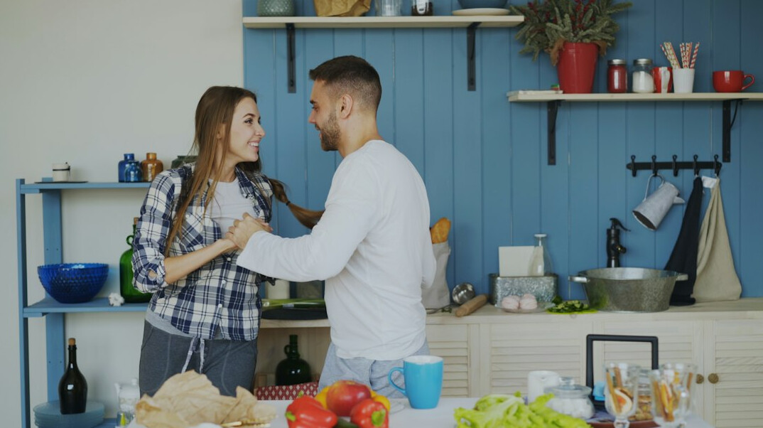couple arguing in kitchen
