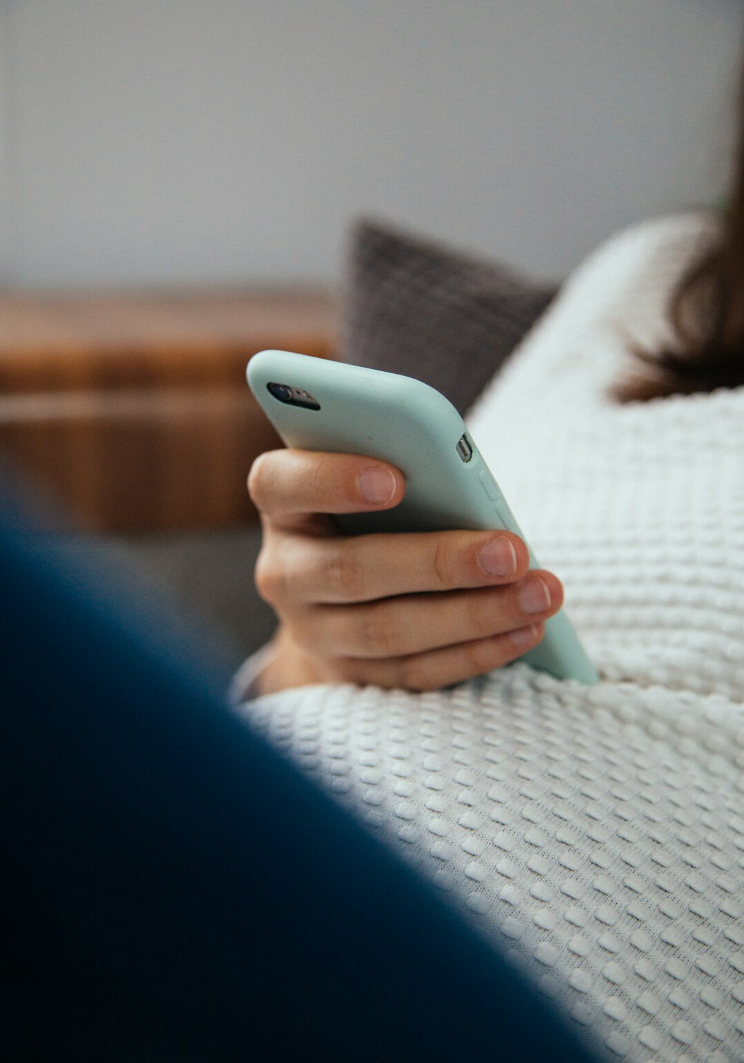 woman reading message on phone